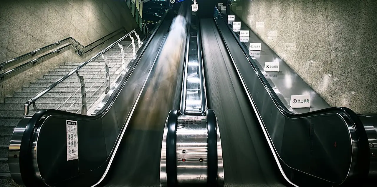 Dynamic shot of a modern escalator in a subway station in Beijing, China.