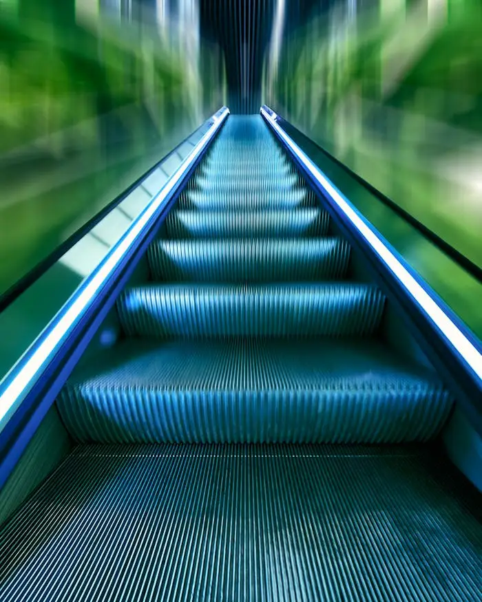 A vibrant, futuristic view of an escalator captured with dynamic motion blur, emphasizing speed and movement.